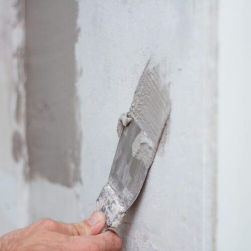 man-hand-with-trowel-plastering-a-wall-skim-coati-2025-01-08-09-10-09-utc man-hand-with-trowel-plastering-a-wall-skim-coati-2025-01-08-09-10-09-utc
